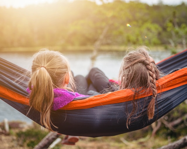 2 children on a hammock